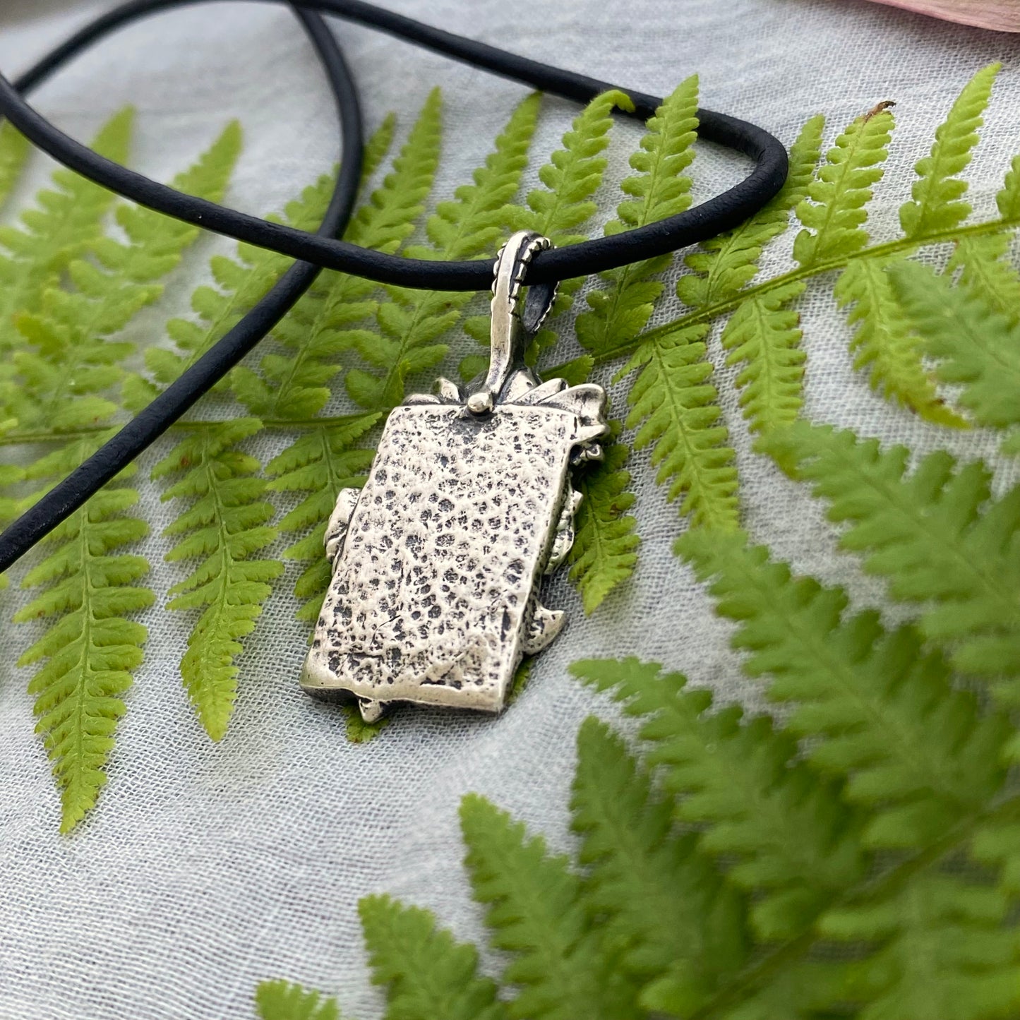 Romantic Victorian style sterling silver rose pendant, black leather cord necklace, hand carved original design with rose, bud, and leaves