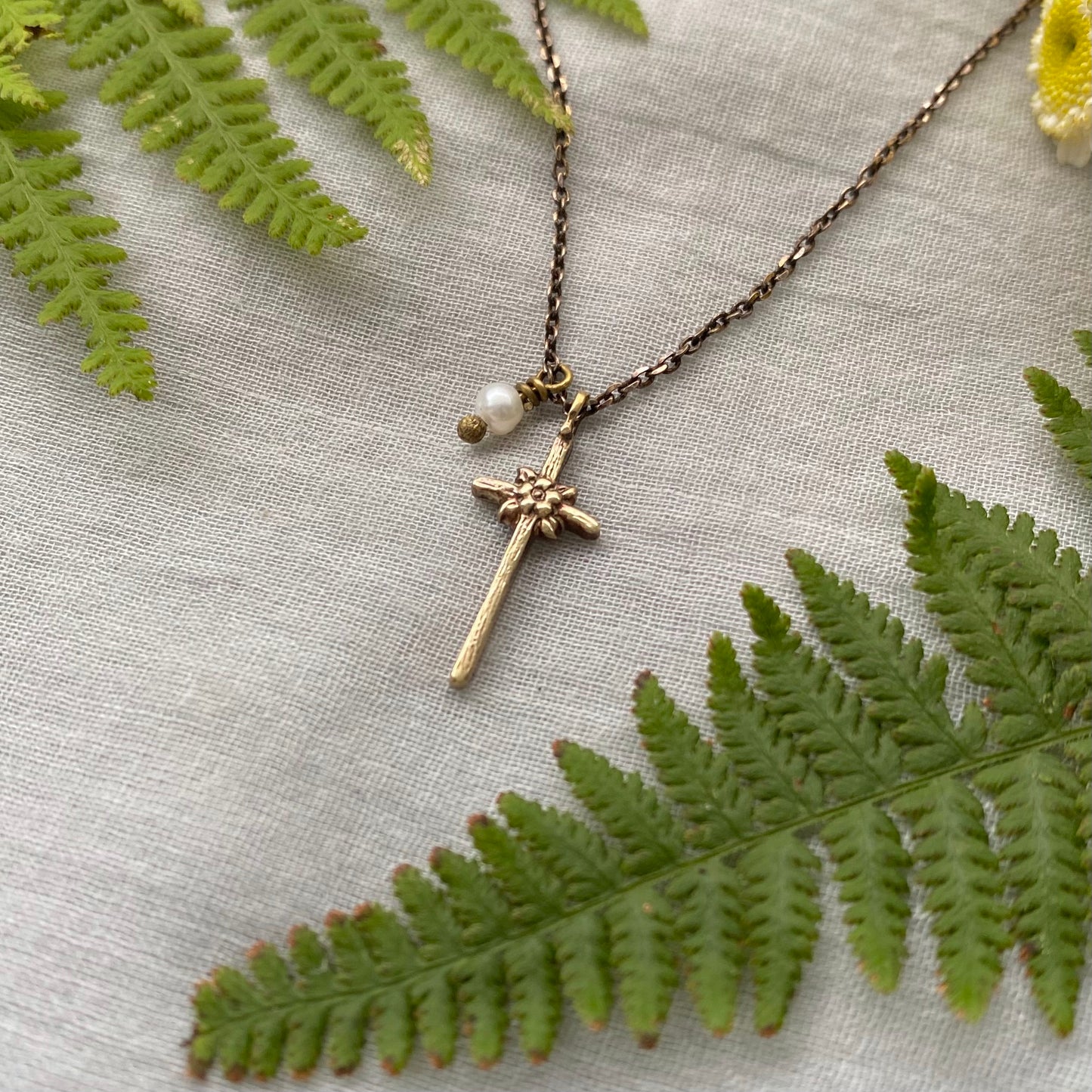 Tiny dainty cross necklace with freshwater pearl; antiqued brass pendant and chain