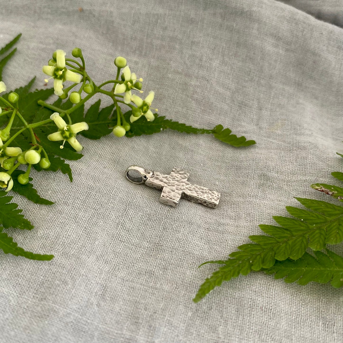 chunky small sterling silver cross pendant; unusual swirling wave design; for men, women; hand carved, artist designed necklace component
