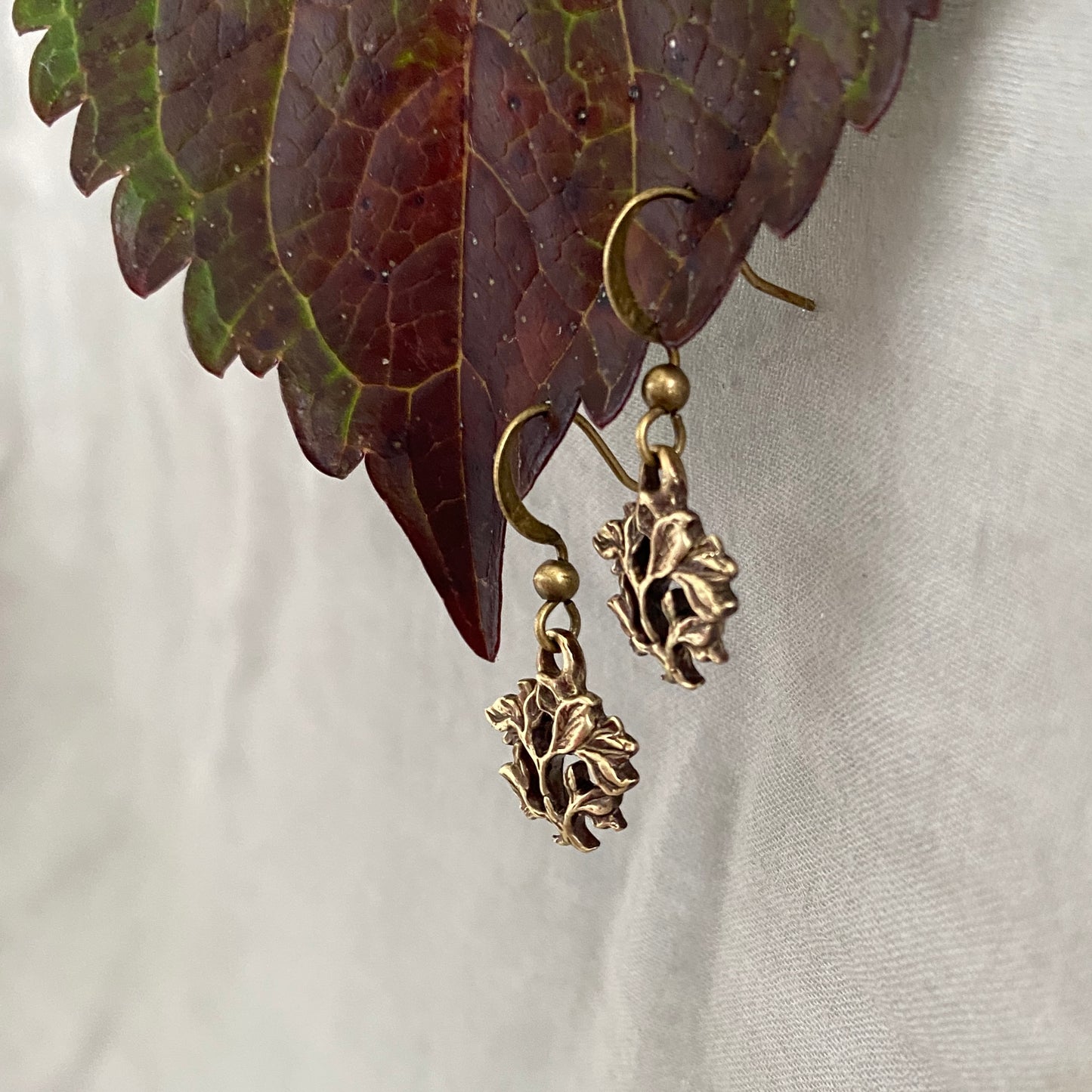 Dainty, antiqued brass tree of life earrings, hand-carved design; antiqued brass ear hooks