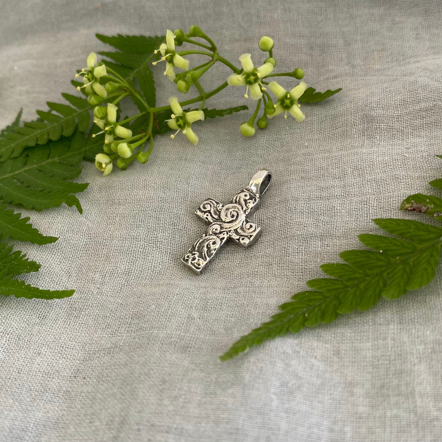 chunky small sterling silver cross pendant; unusual swirling wave design; for men, women; hand carved, artist designed necklace component
