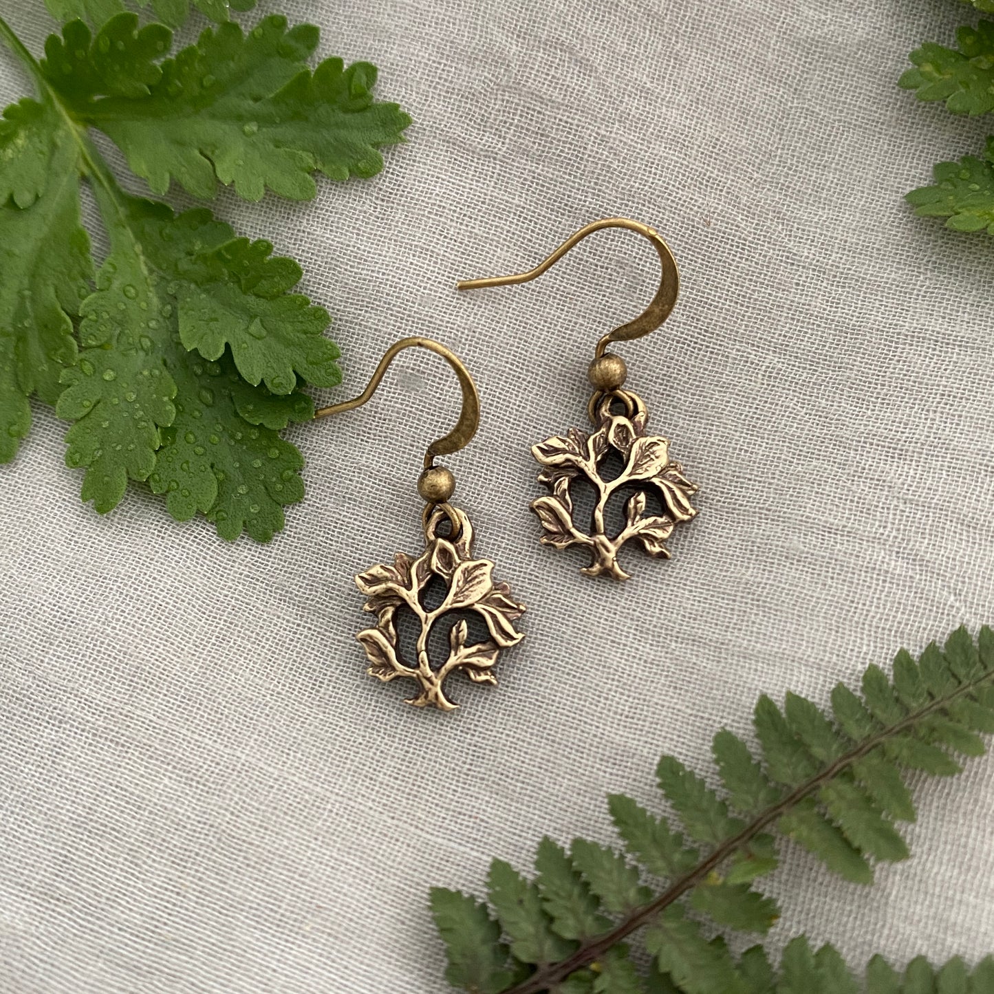 Dainty, antiqued brass tree of life earrings, hand-carved design; antiqued brass ear hooks