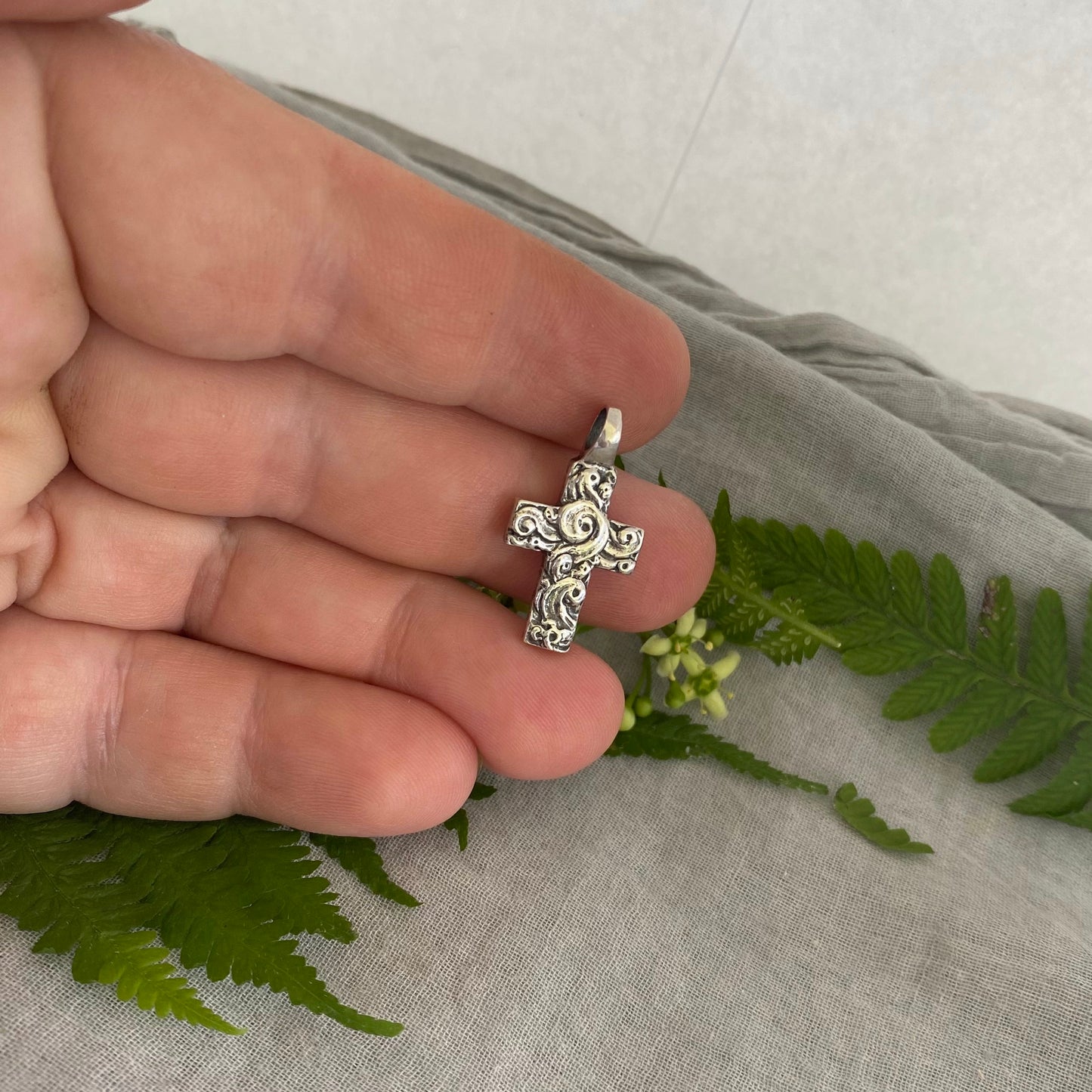 chunky small sterling silver cross pendant; unusual swirling wave design; for men, women; hand carved, artist designed necklace component