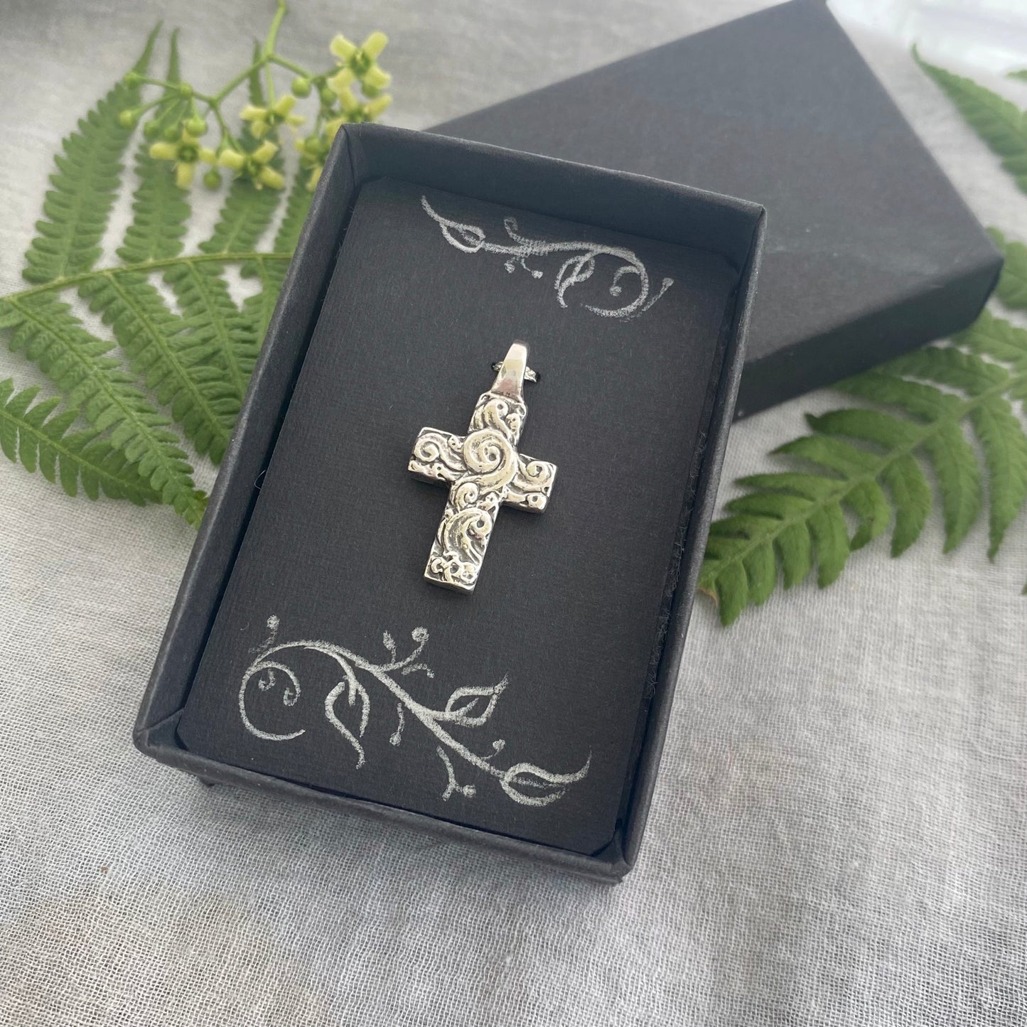 chunky small sterling silver cross pendant; unusual swirling wave design; for men, women; hand carved, artist designed necklace component