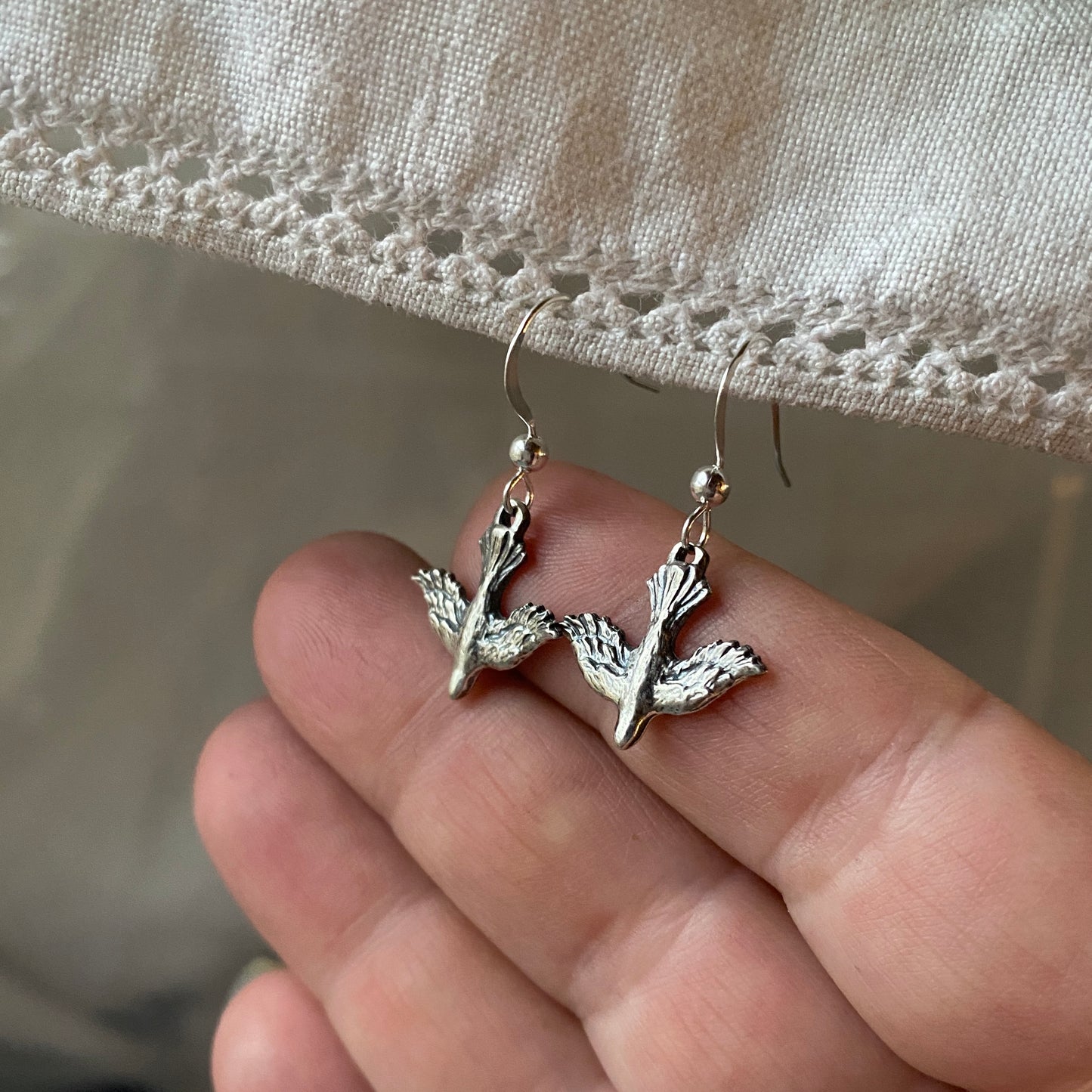 Dainty, dangling, descending dove earrings; solid sterling silver