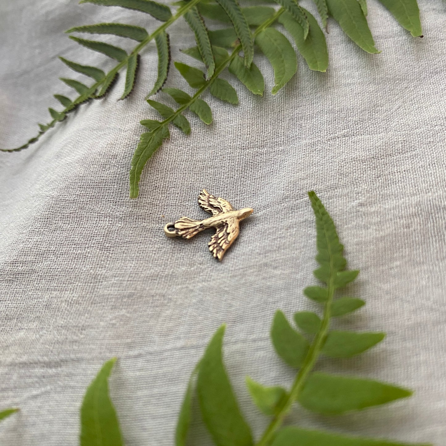 Tiny, Antiqued Brass, Descending Dove Charm; Unique, Hand Carved Design