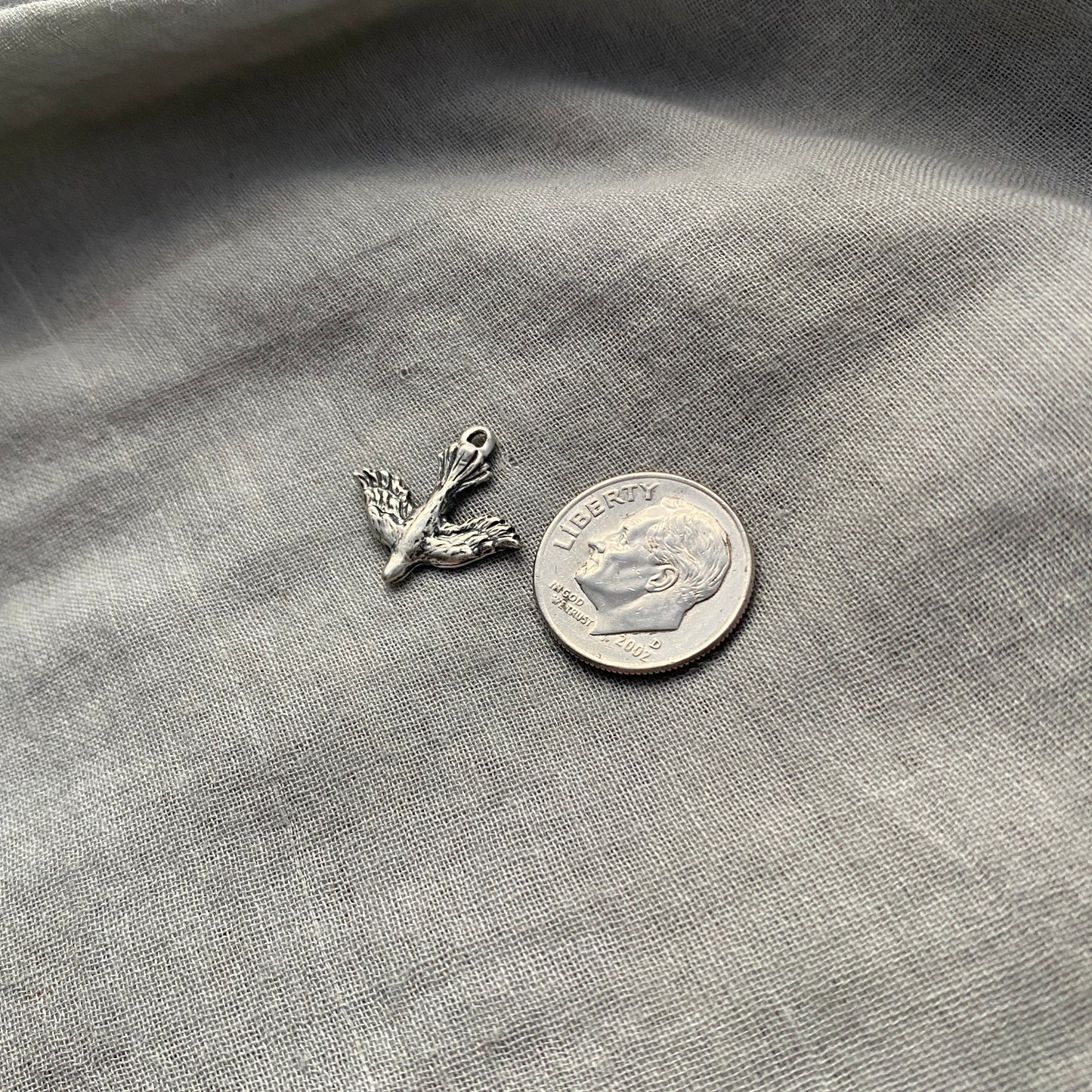 Dainty, dangling, descending dove earrings; solid sterling silver