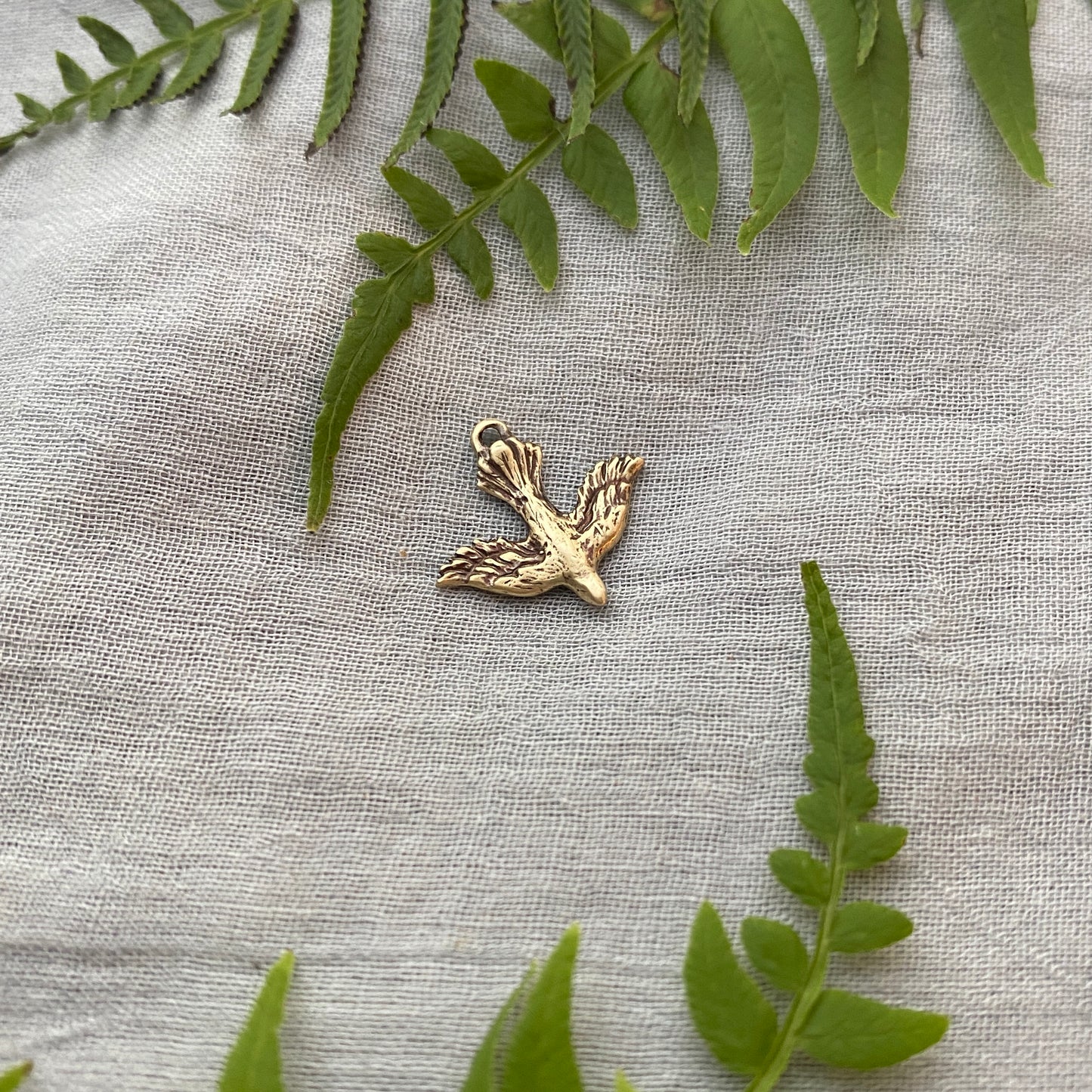 Tiny, Antiqued Brass, Descending Dove Charm; Unique, Hand Carved Design
