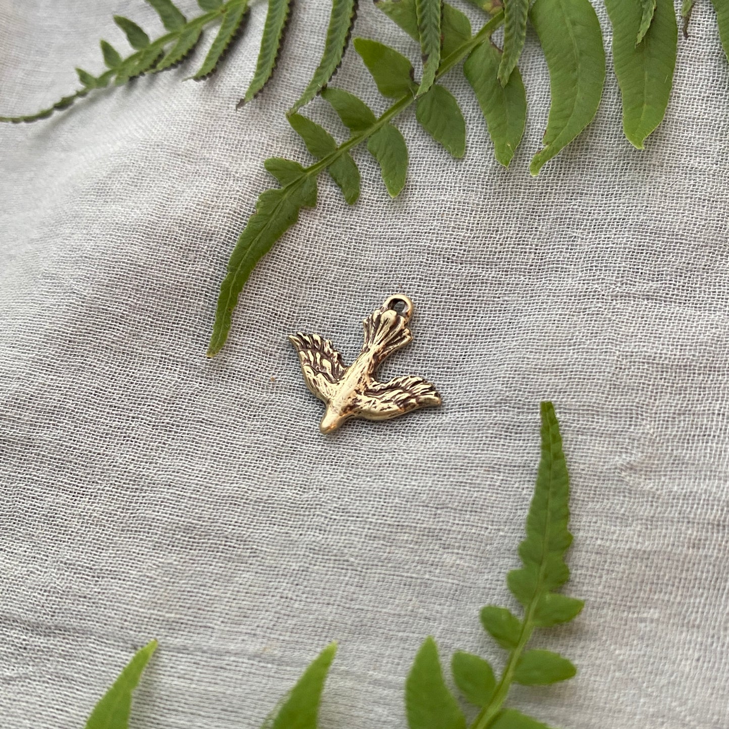 Tiny, Antiqued Brass, Descending Dove Charm; Unique, Hand Carved Design