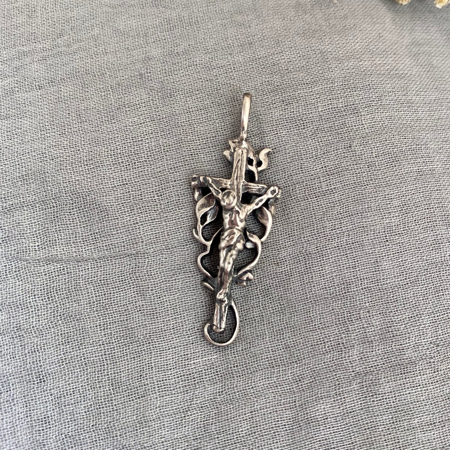 sterling silver crucifix with vine and leaves