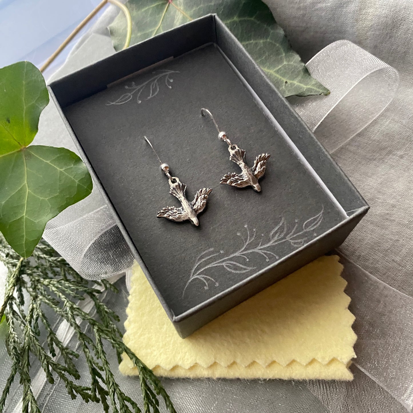 Dainty, dangling, descending dove earrings; solid sterling silver