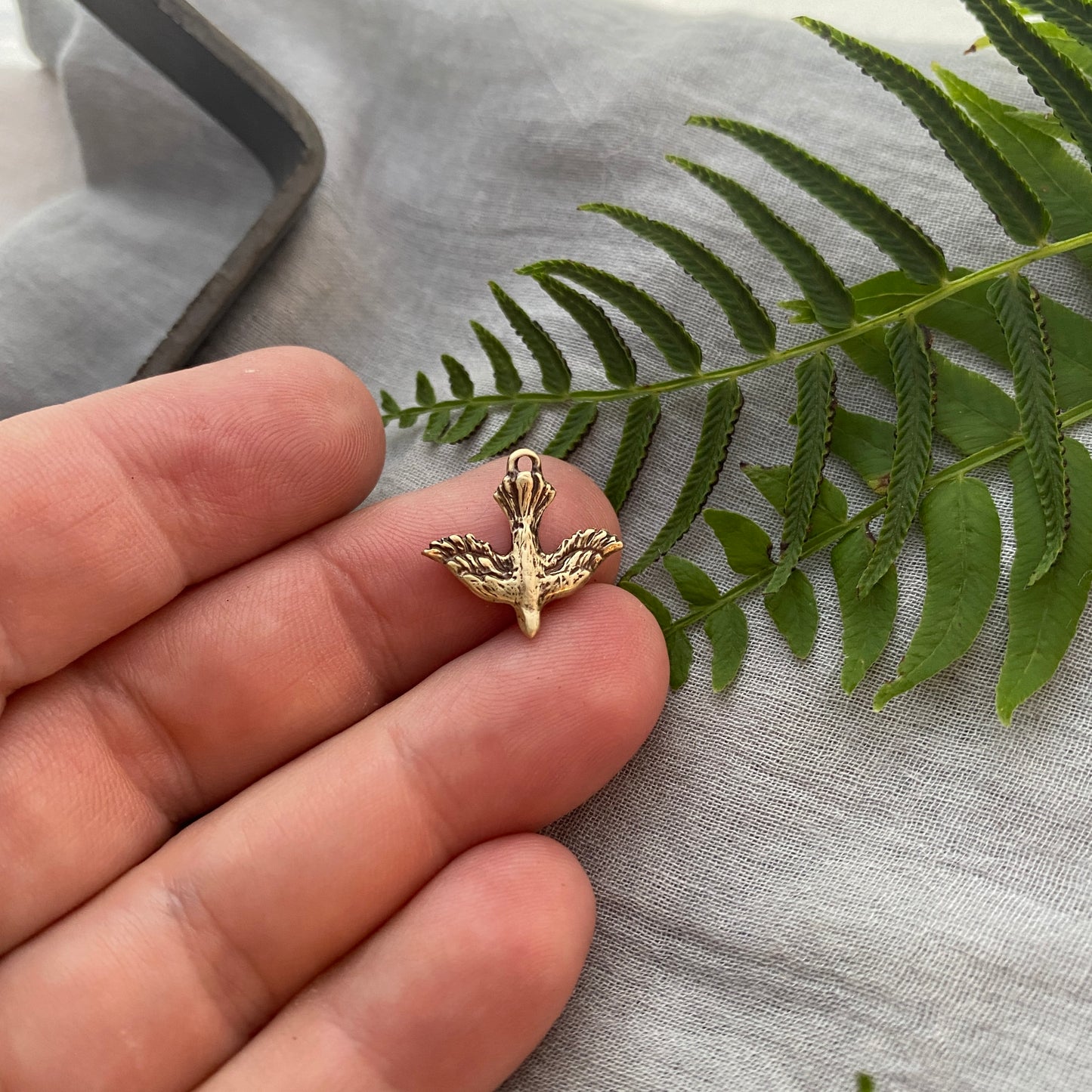 Tiny, Antiqued Brass, Descending Dove Charm; Unique, Hand Carved Design