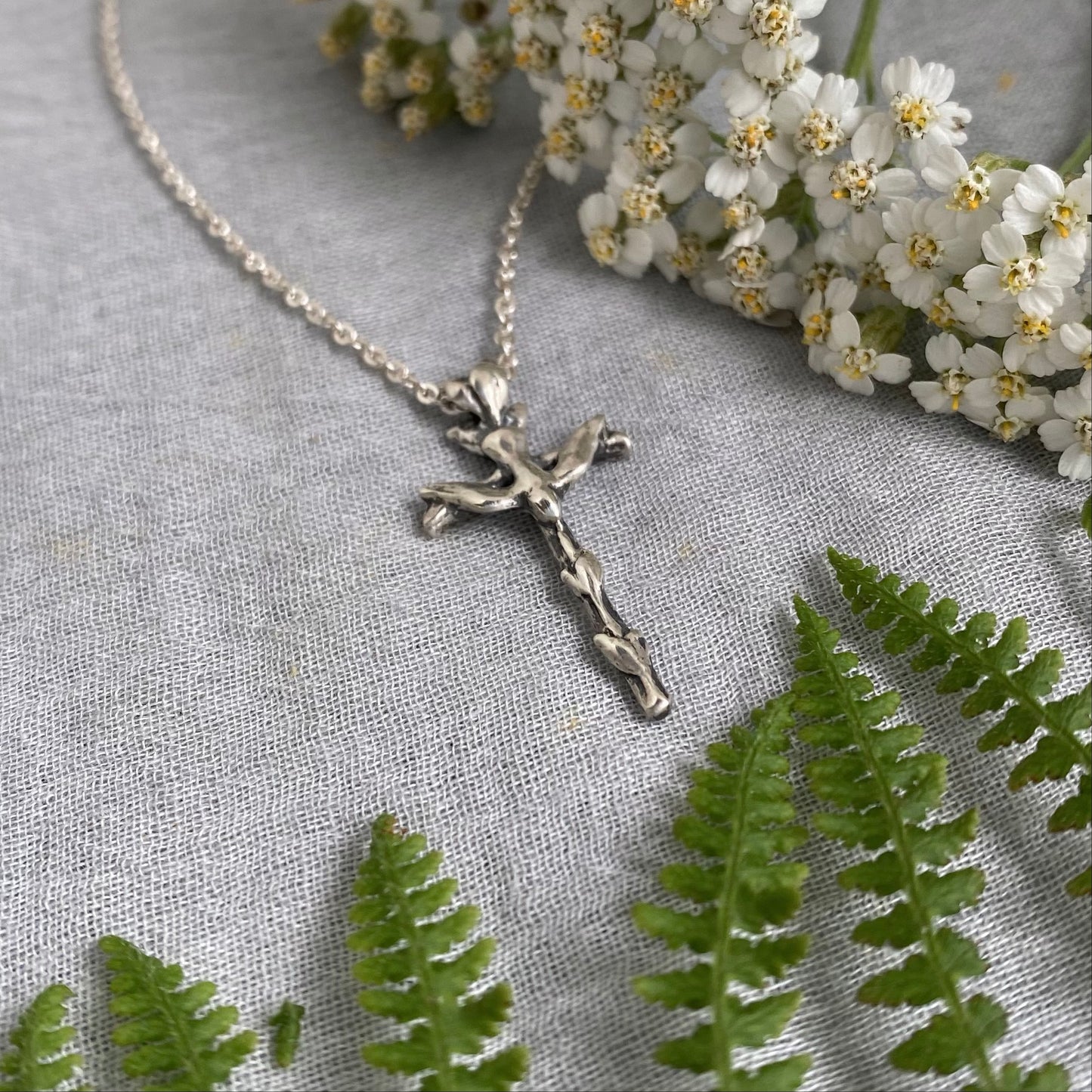 Small sterling silver cross necklace with dove