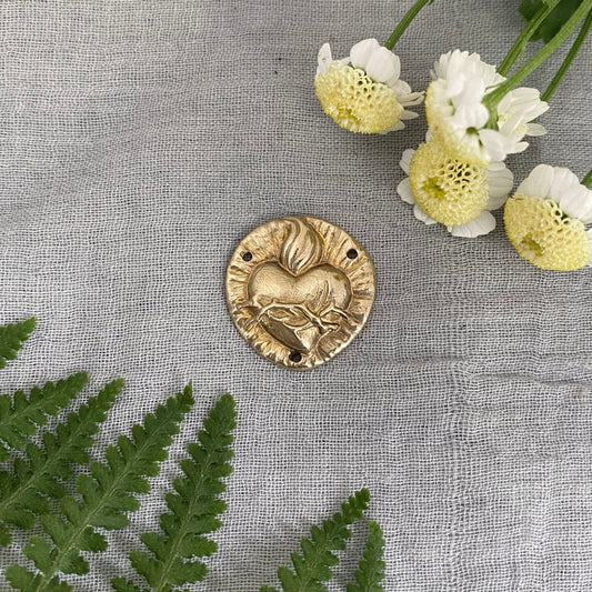 brass sacred heart rosary centerpiece