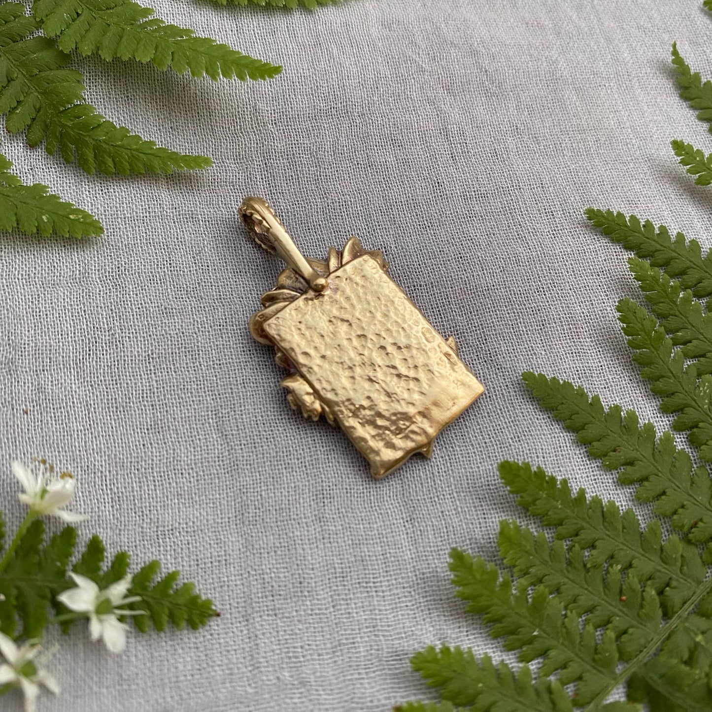 Sculptural brass rose pendant with rosebud and leaves