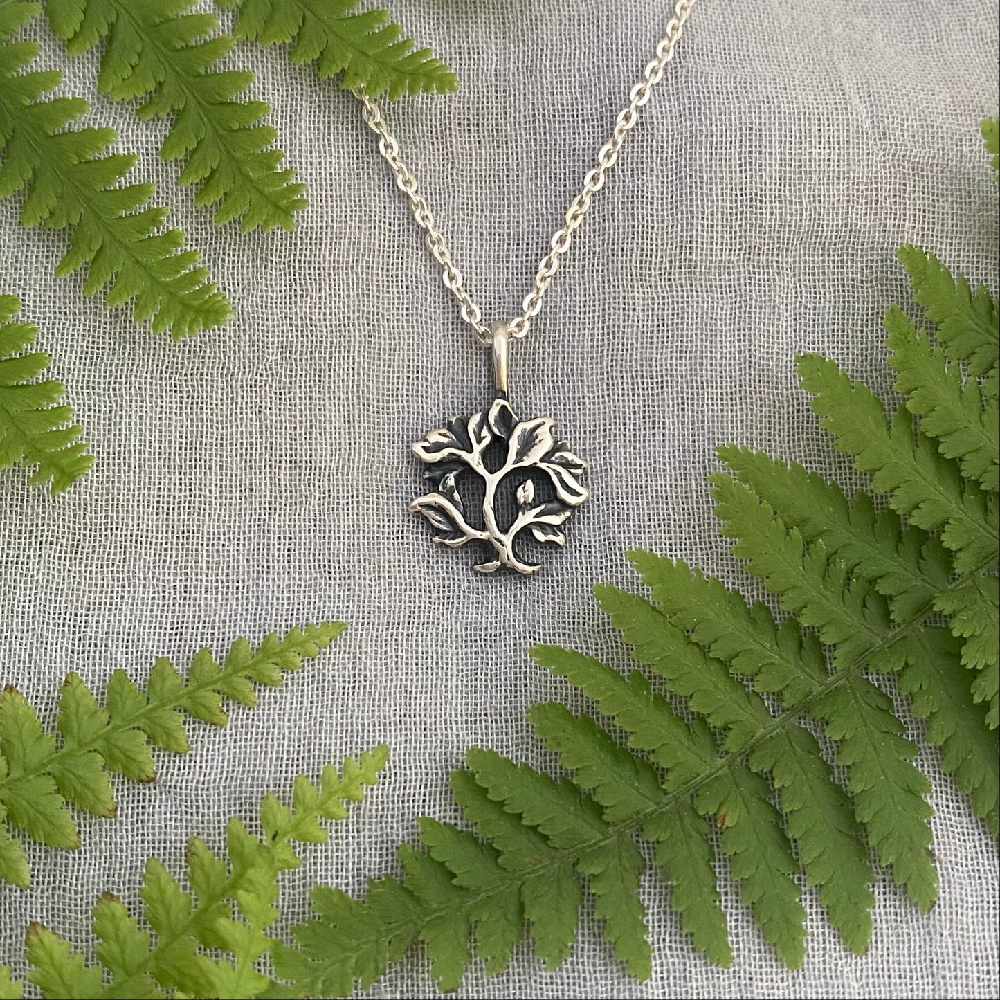 Tiny minimalist tree of life necklace in sterling silver