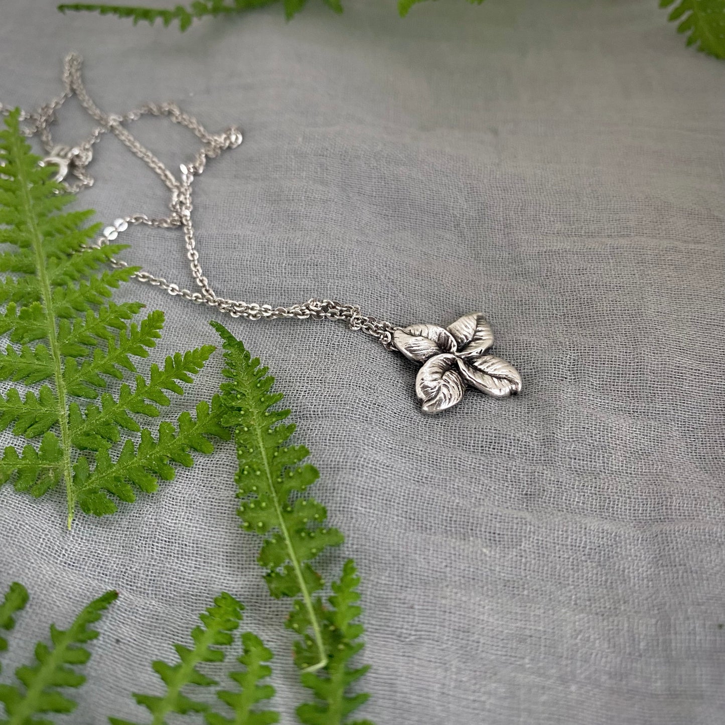 small sterling silver leaf cross pendant