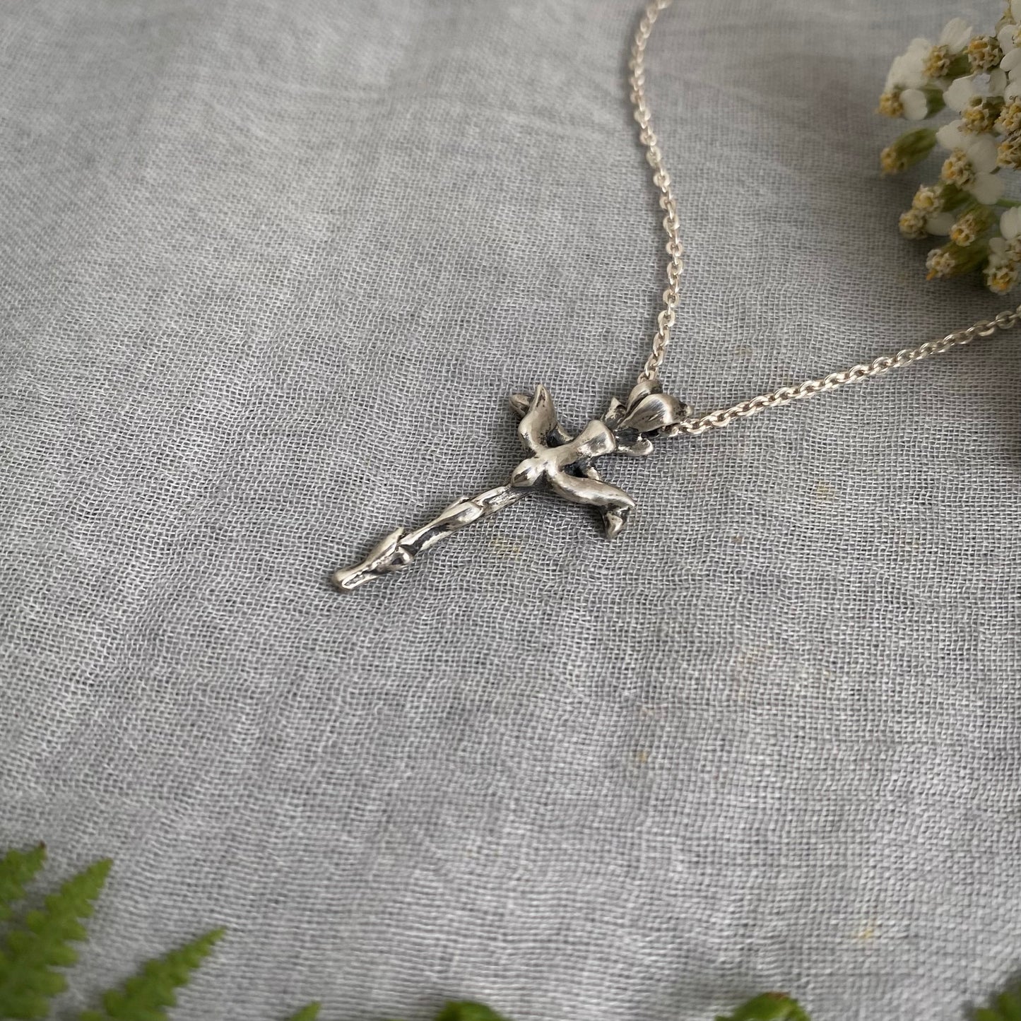 Small sterling silver cross necklace with dove